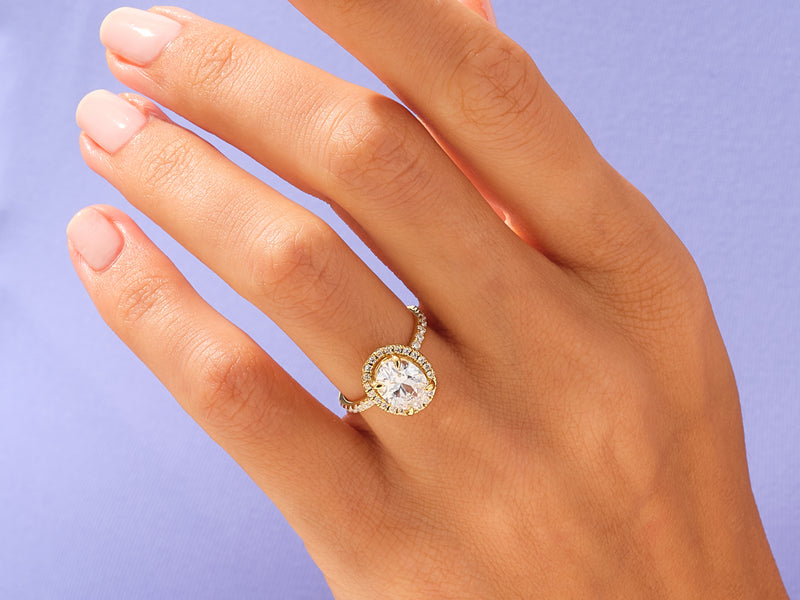 Oval Halo Engagement Ring with Pave Set Side Stones