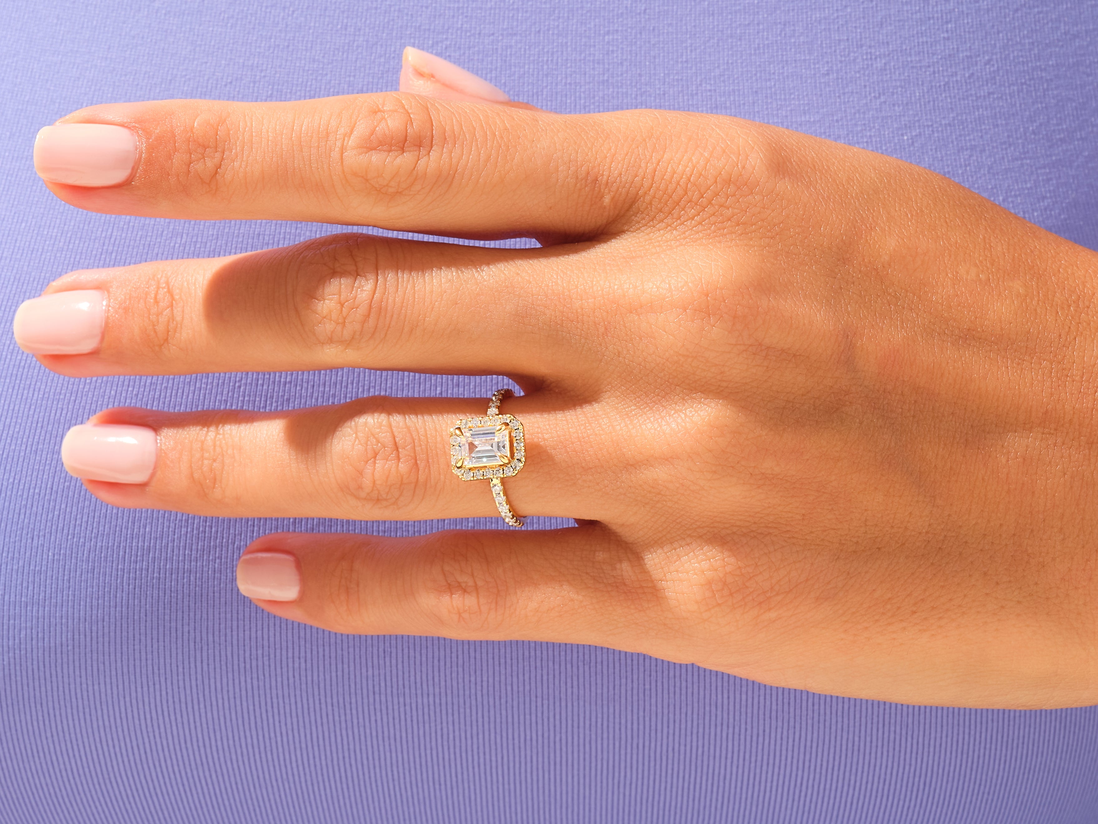 Emerald Halo Engagement Ring with Pave Set Side Stones