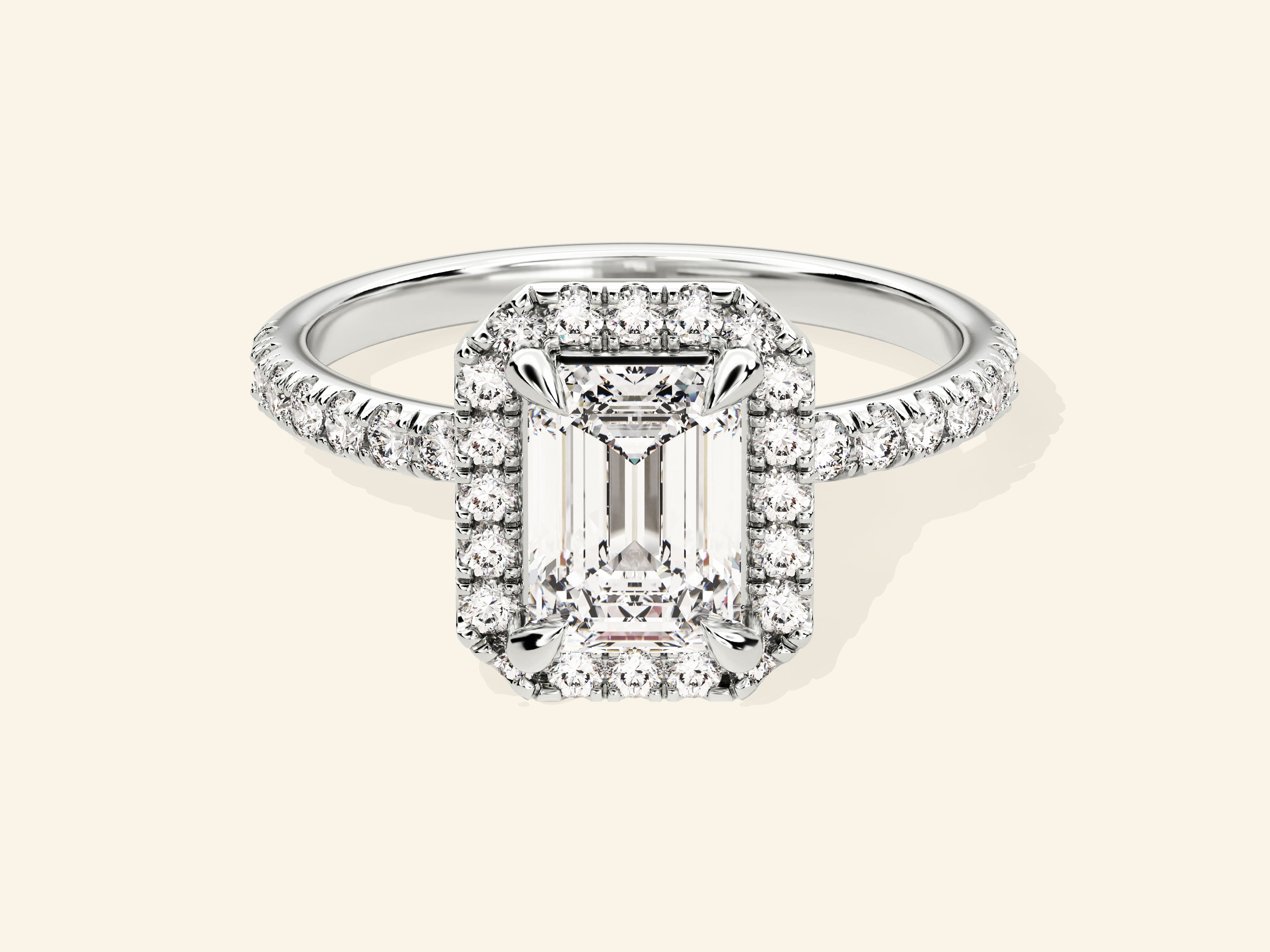Emerald Halo Engagement Ring with Pave Set Side Stones