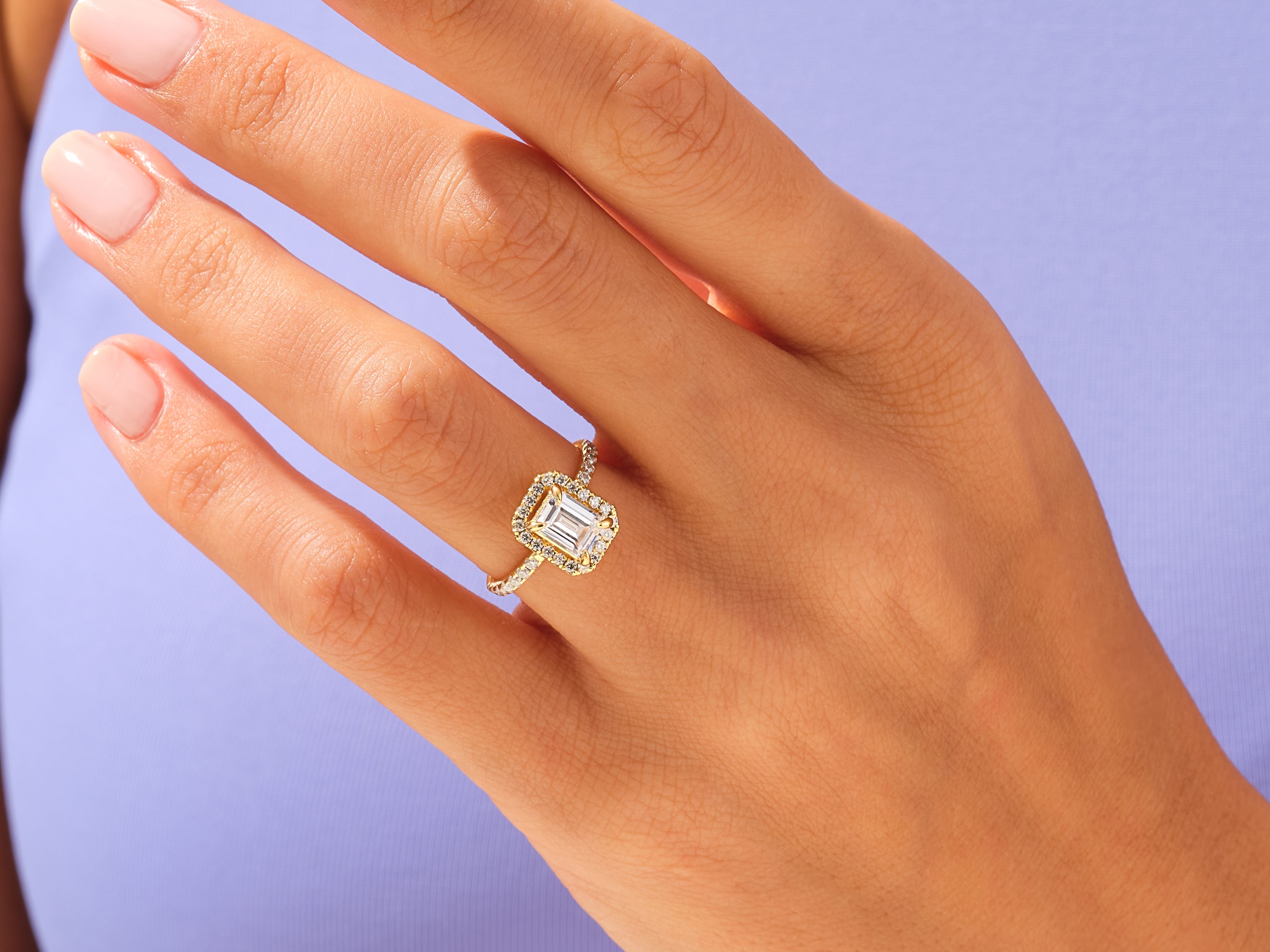 Emerald Halo Engagement Ring with Pave Set Side Stones