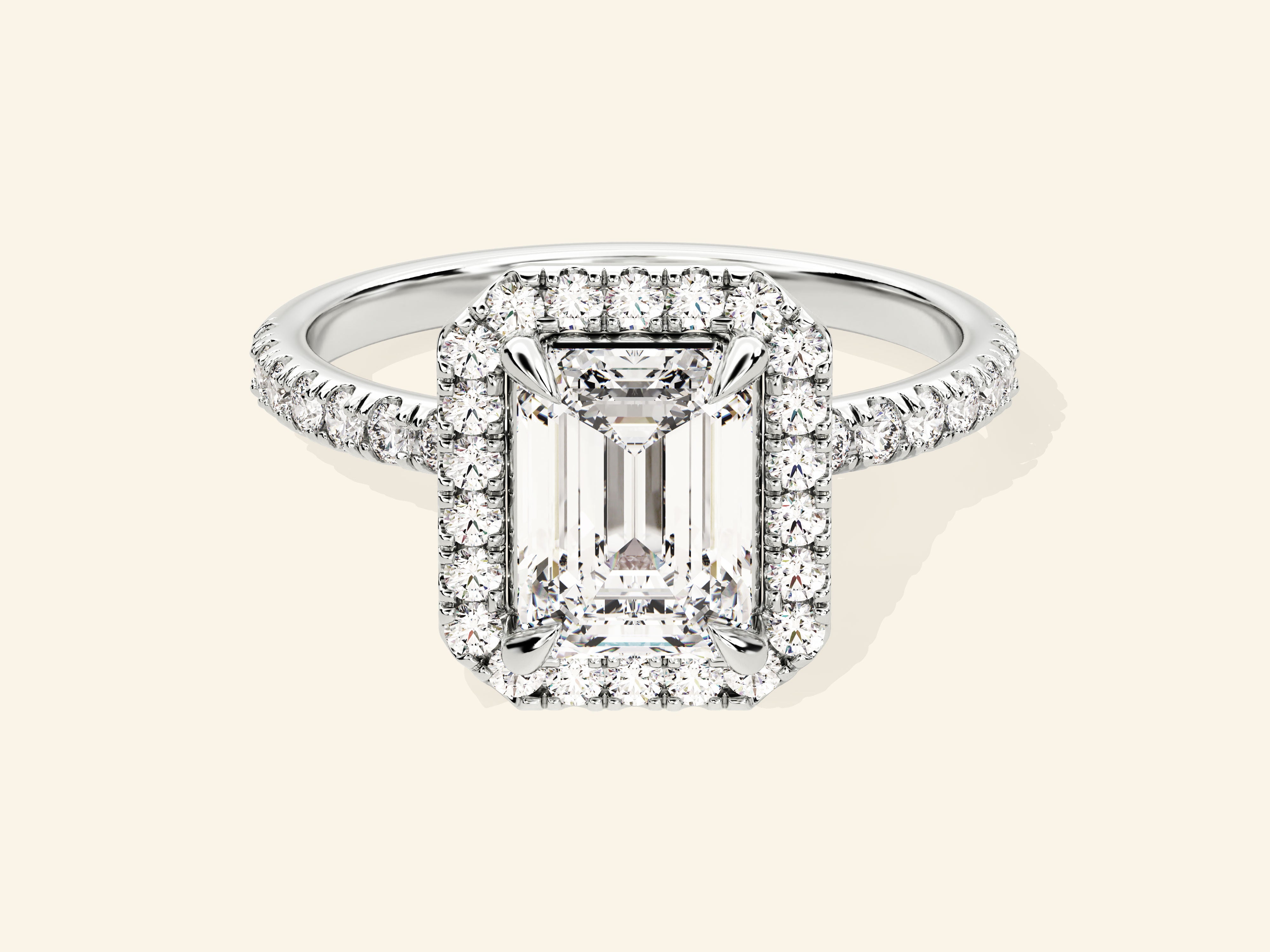 Emerald Halo Engagement Ring with Pave Set Side Stones