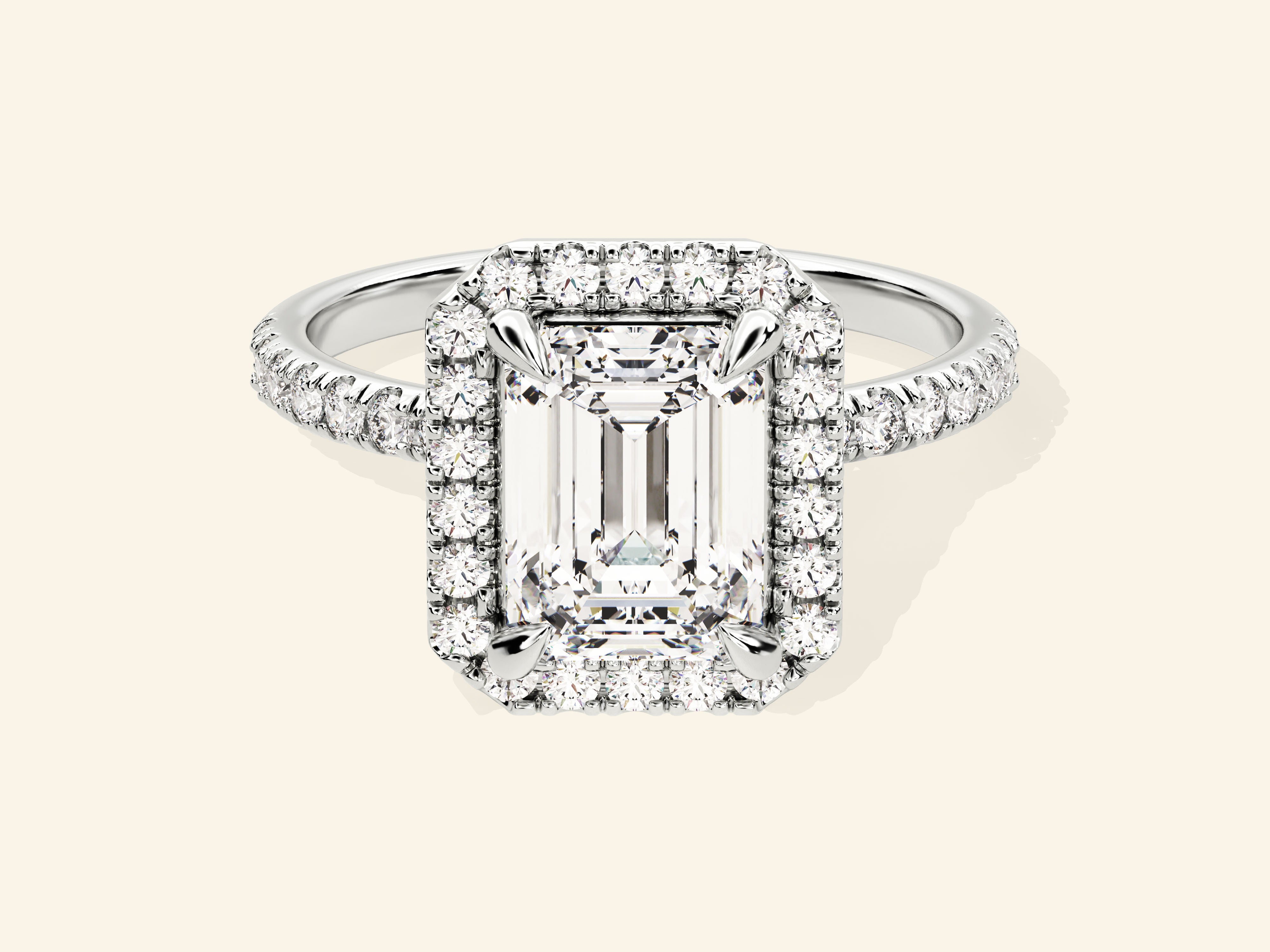 Emerald Halo Engagement Ring with Pave Set Side Stones
