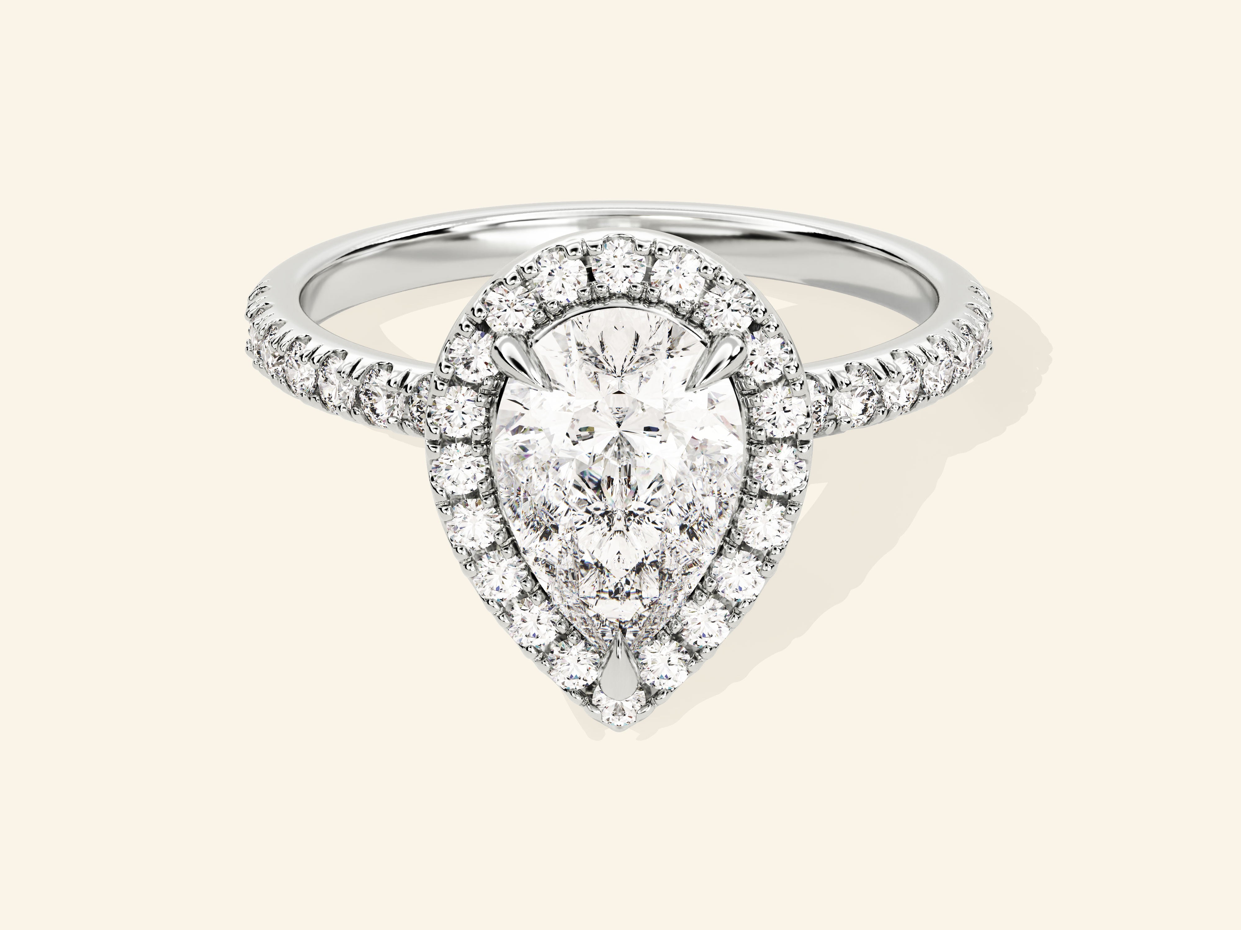 Pear Halo Engagement Ring with Pave Set Side Stones