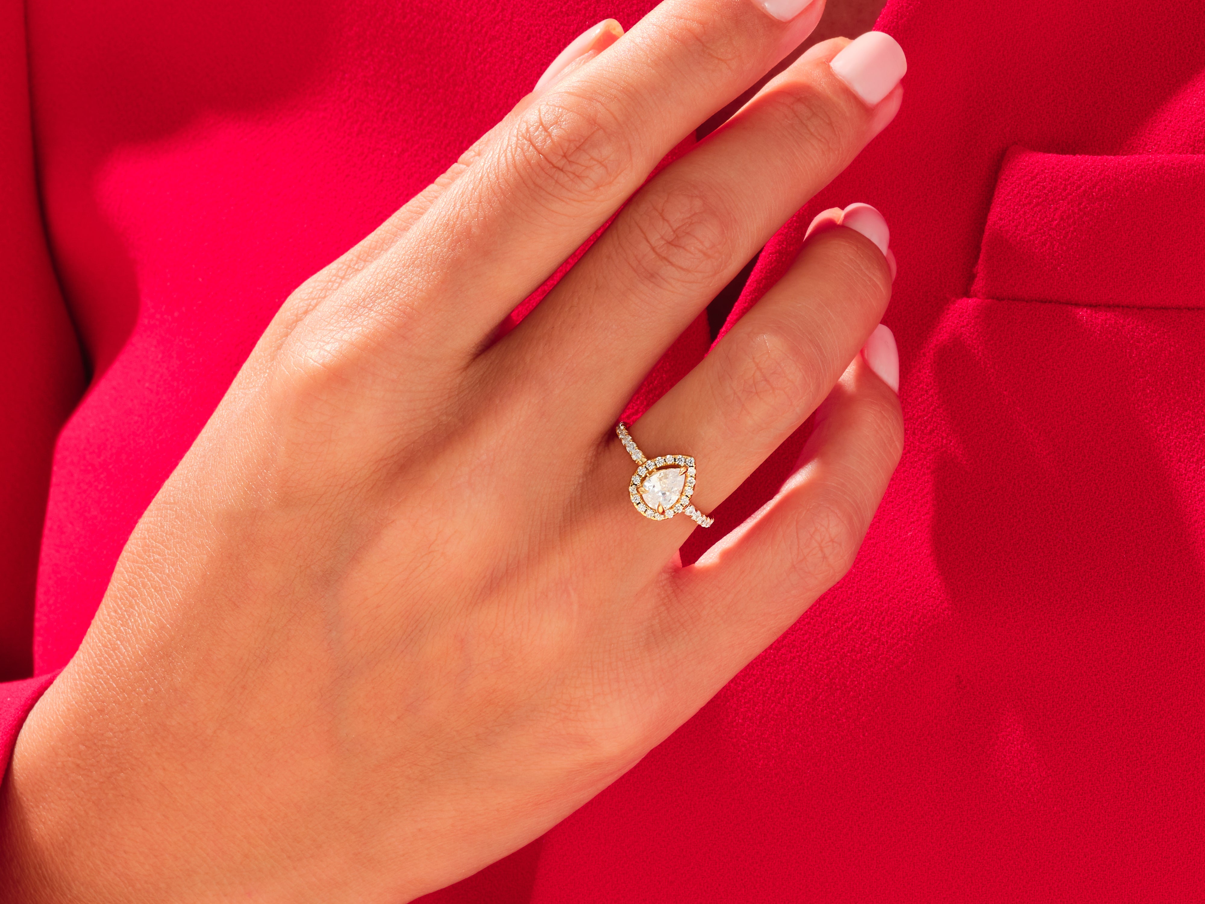 Pear Halo Engagement Ring with Pave Set Side Stones