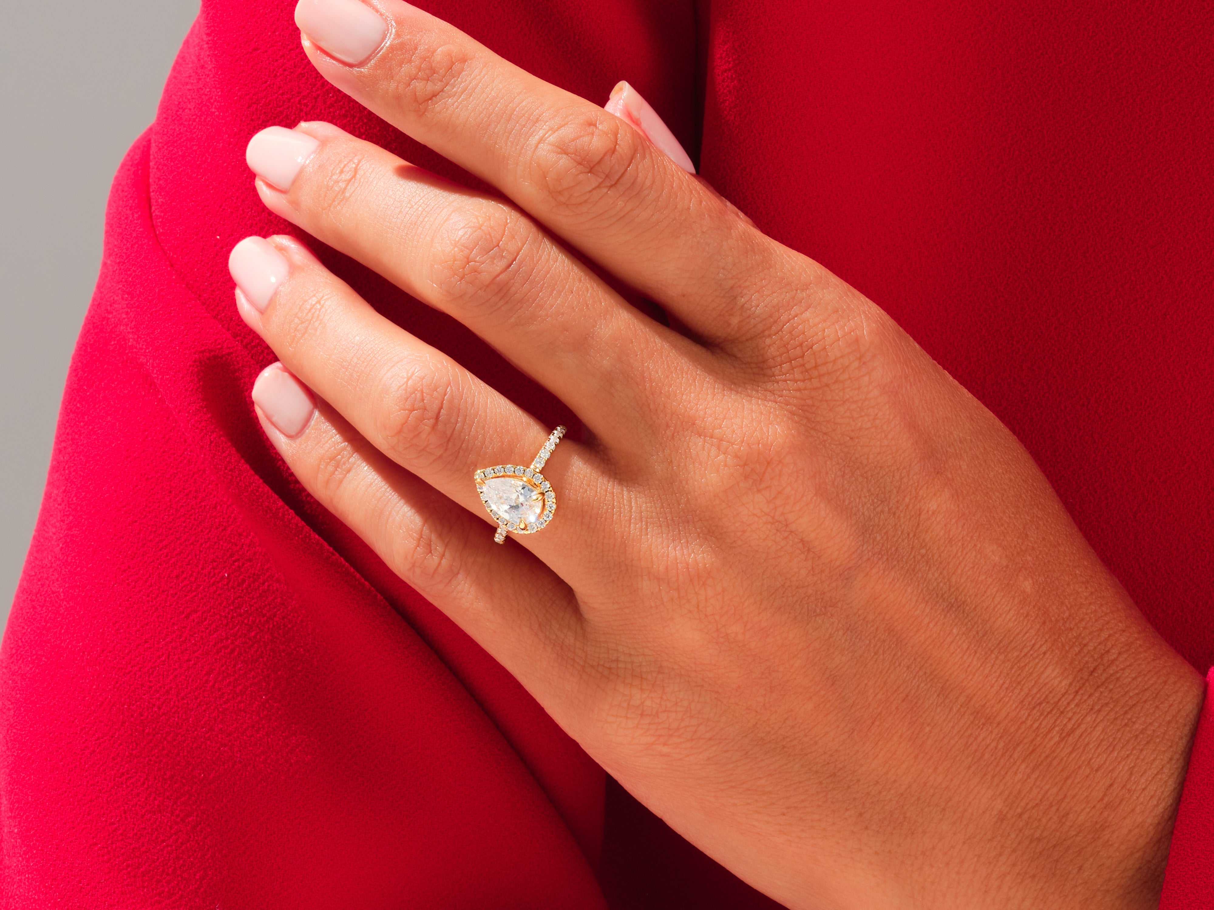 Pear Halo Engagement Ring with Pave Set Side Stones