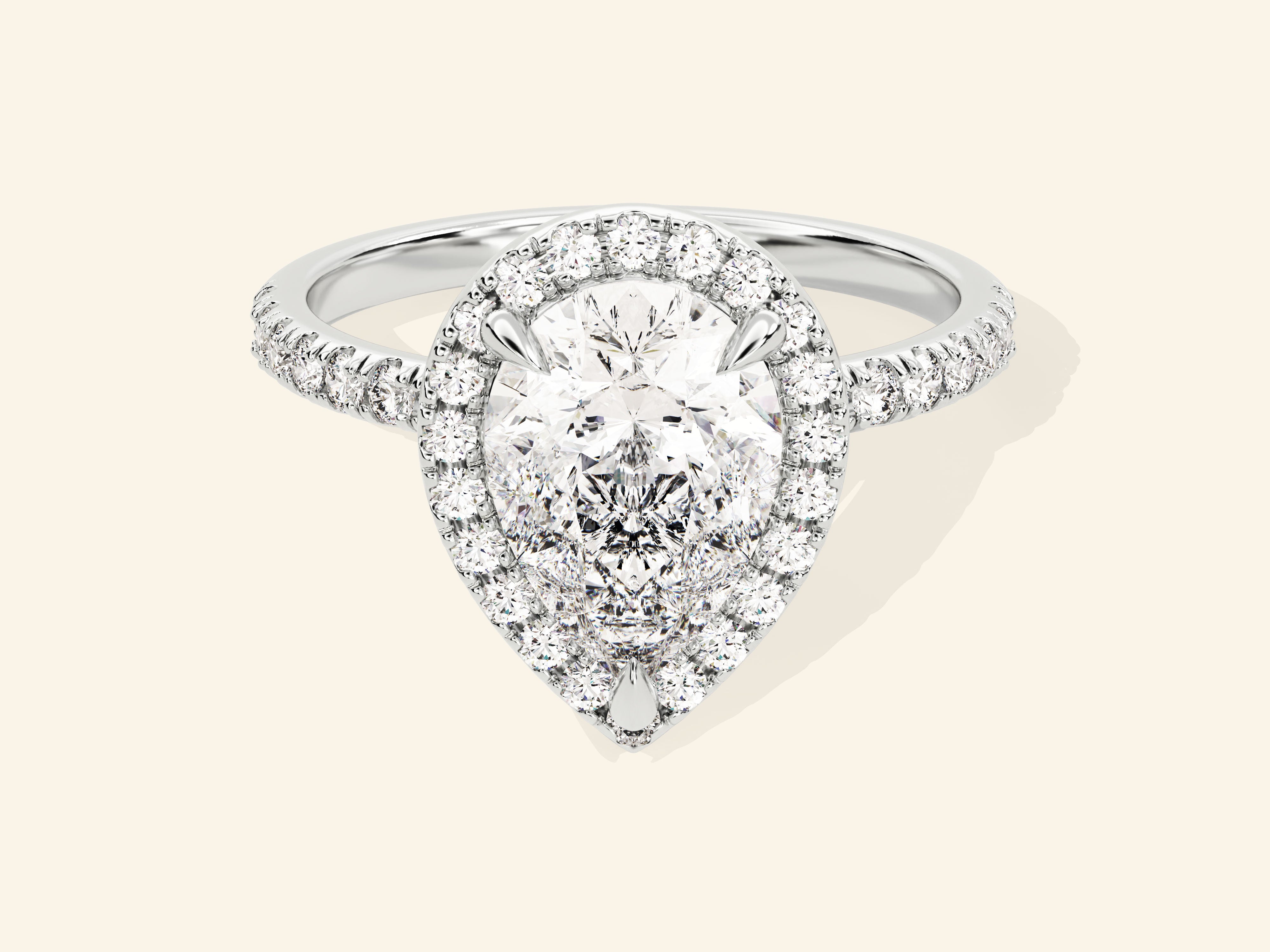 Pear Halo Engagement Ring with Pave Set Side Stones