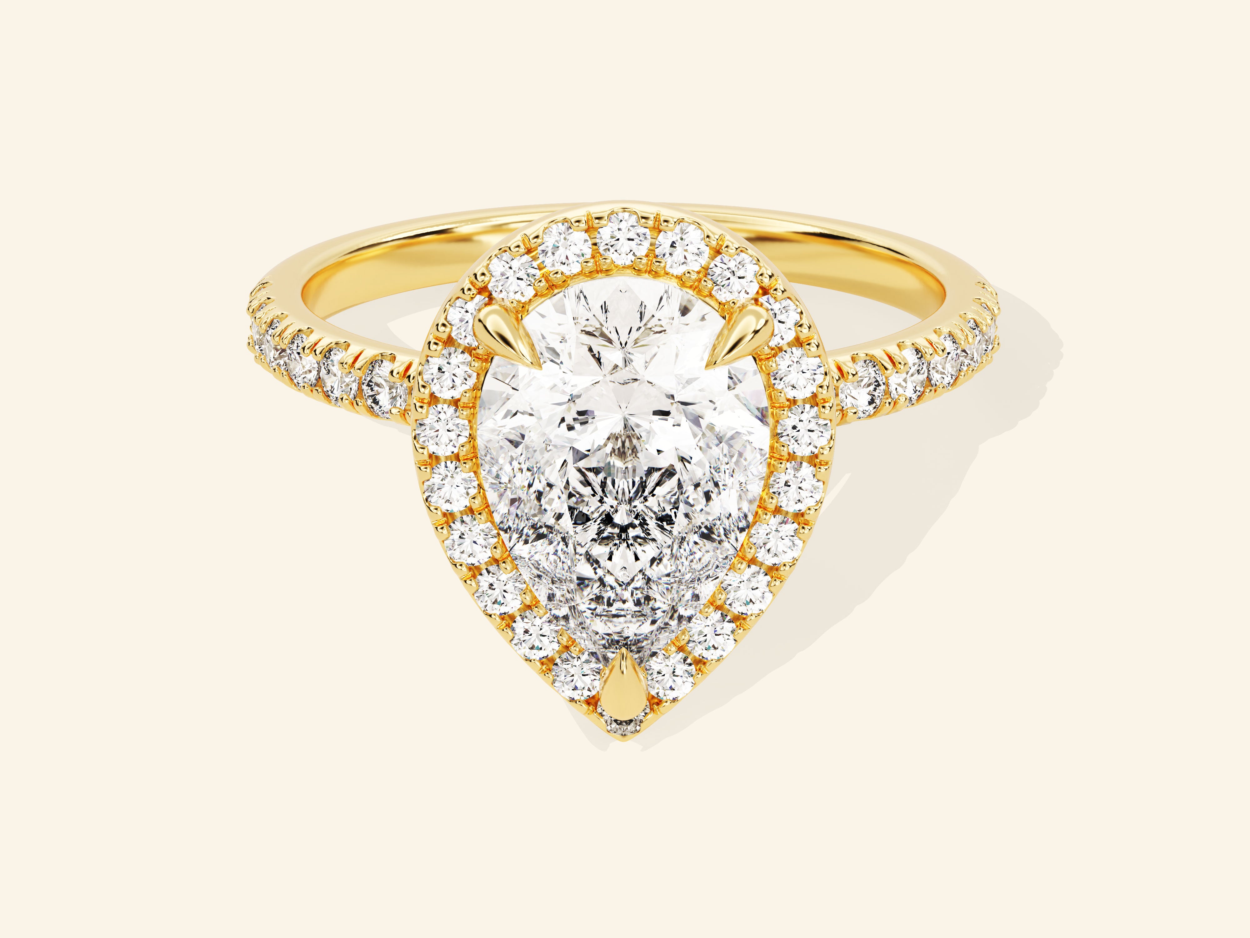 Pear Halo Engagement Ring with Pave Set Side Stones