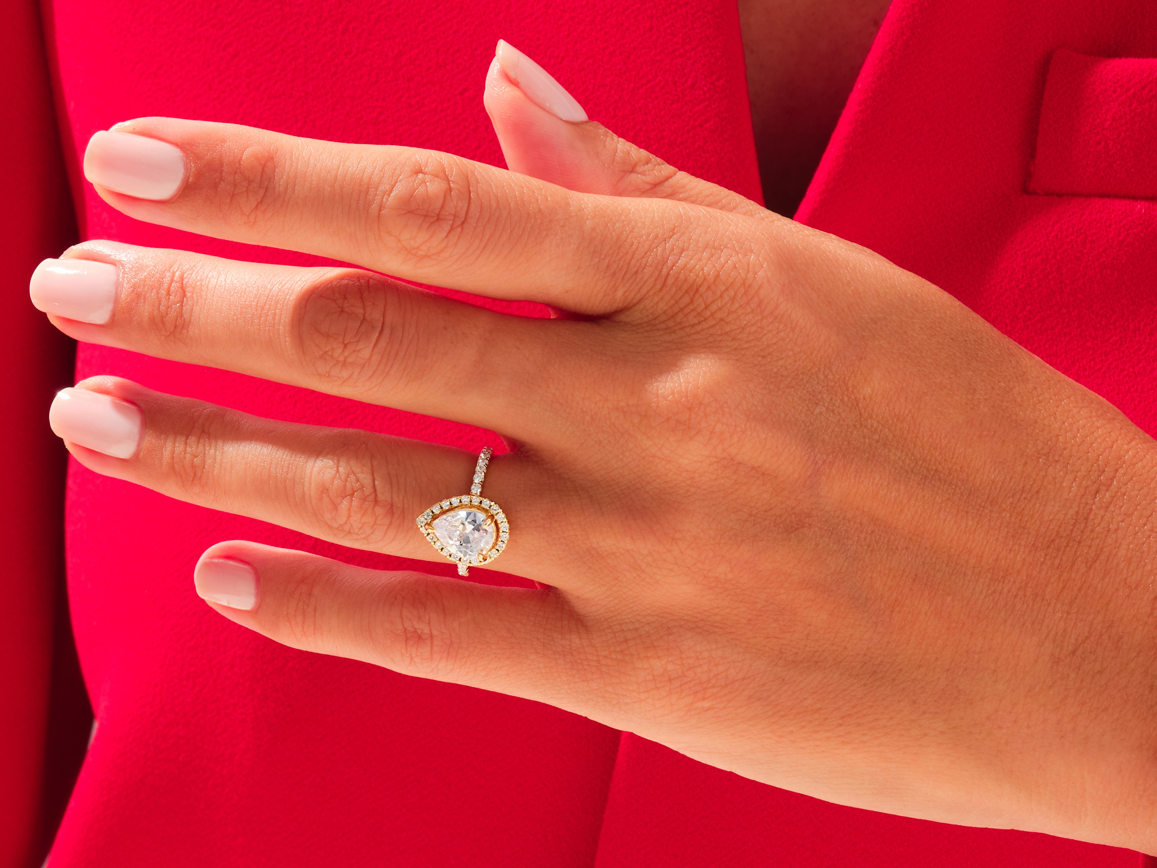 Pear Halo Engagement Ring with Pave Set Side Stones