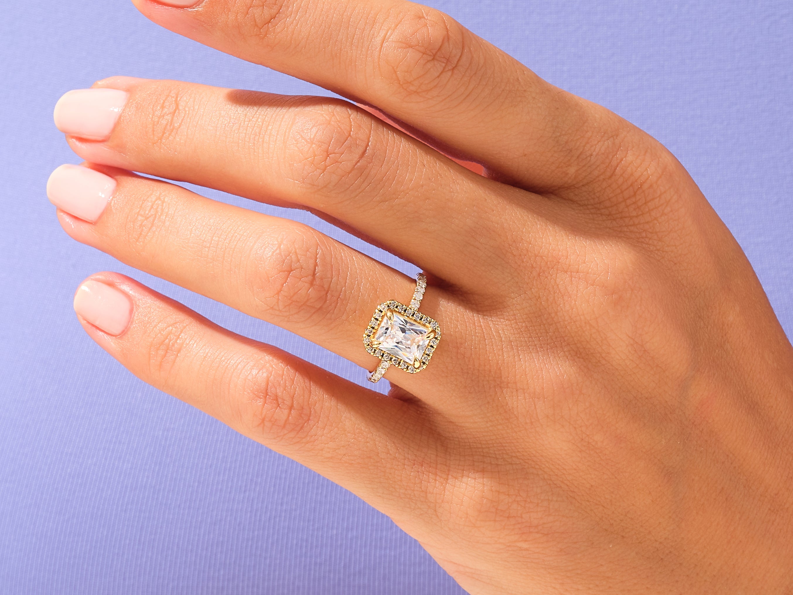 Radiant Halo Engagement Ring with Pave Set Side Stones