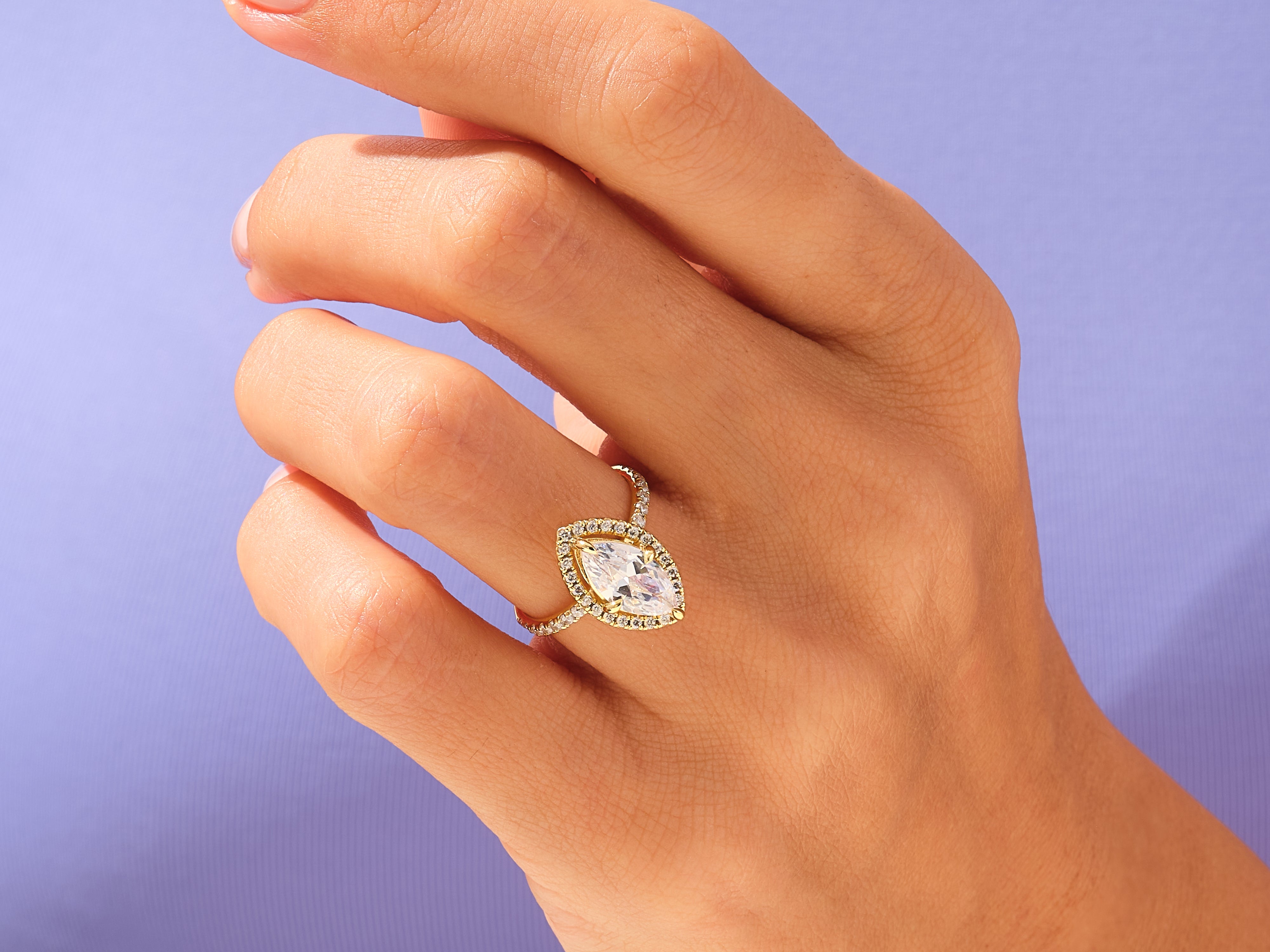 Marquise Halo Engagement Ring with Pave Set Side Stones