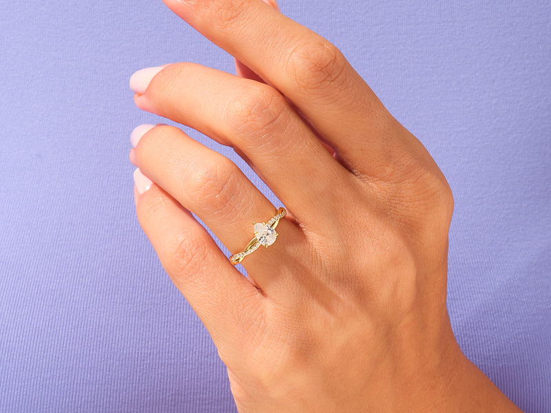 Pear Twisted Engagement Ring