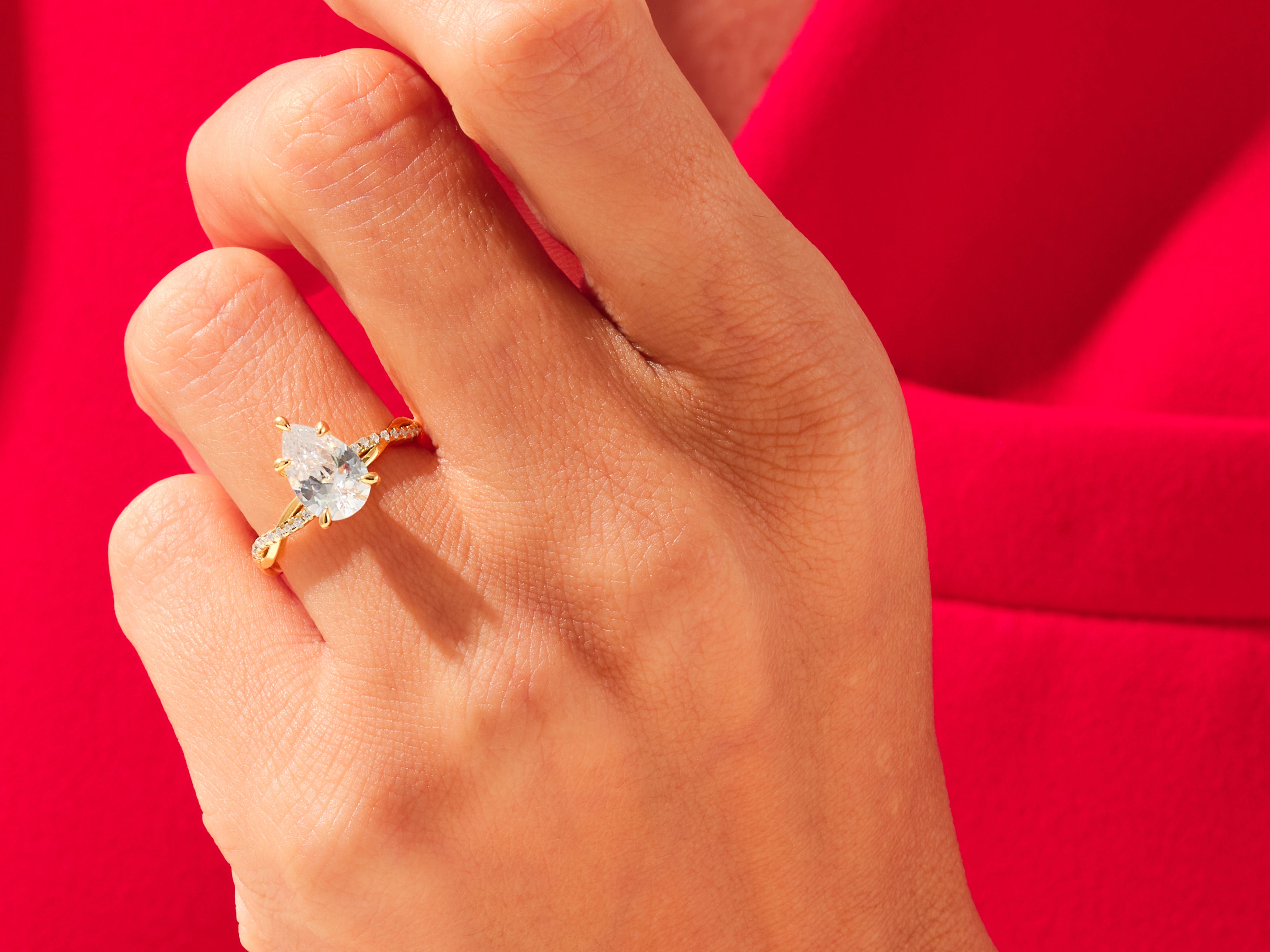 Pear Twisted Engagement Ring