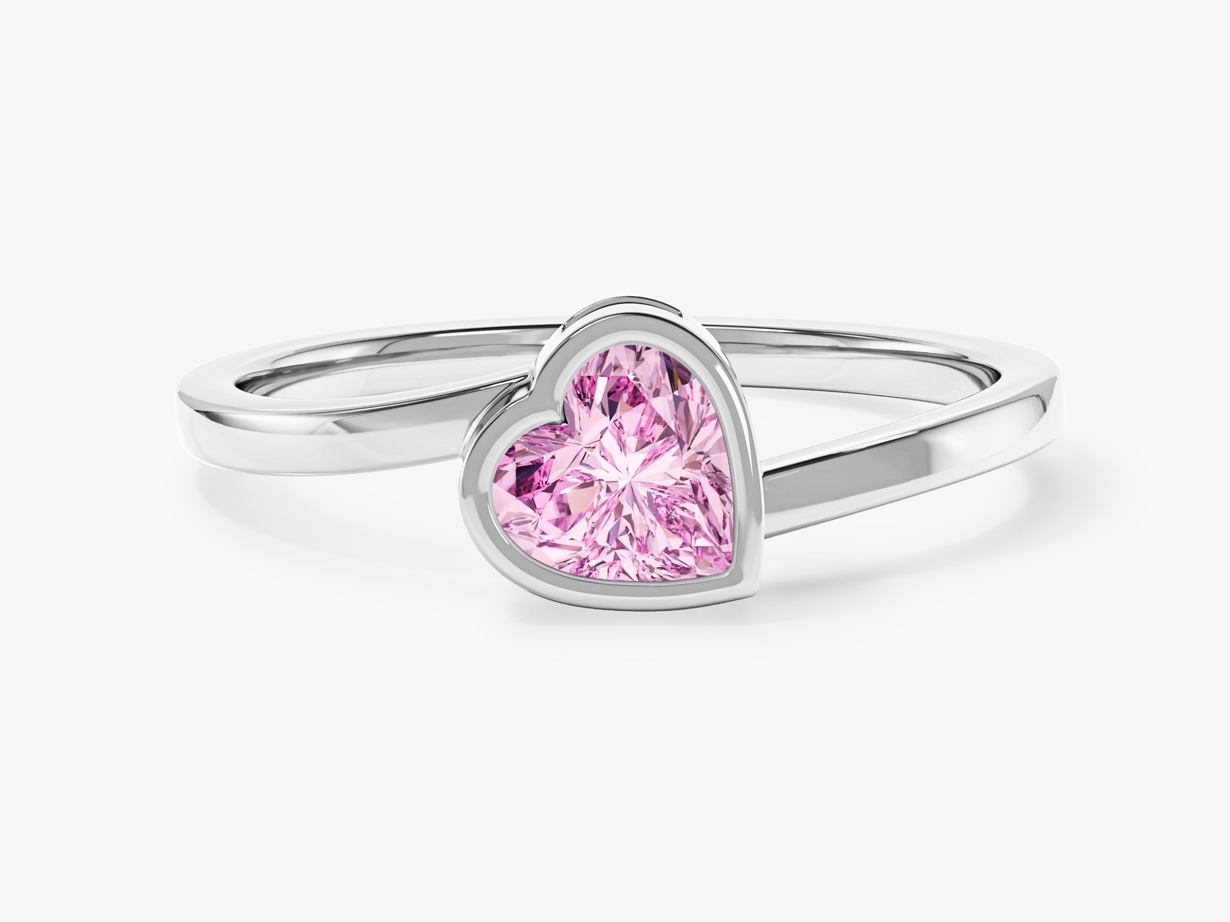 Silver ring with pink heart-shaped gemstone, jewelry