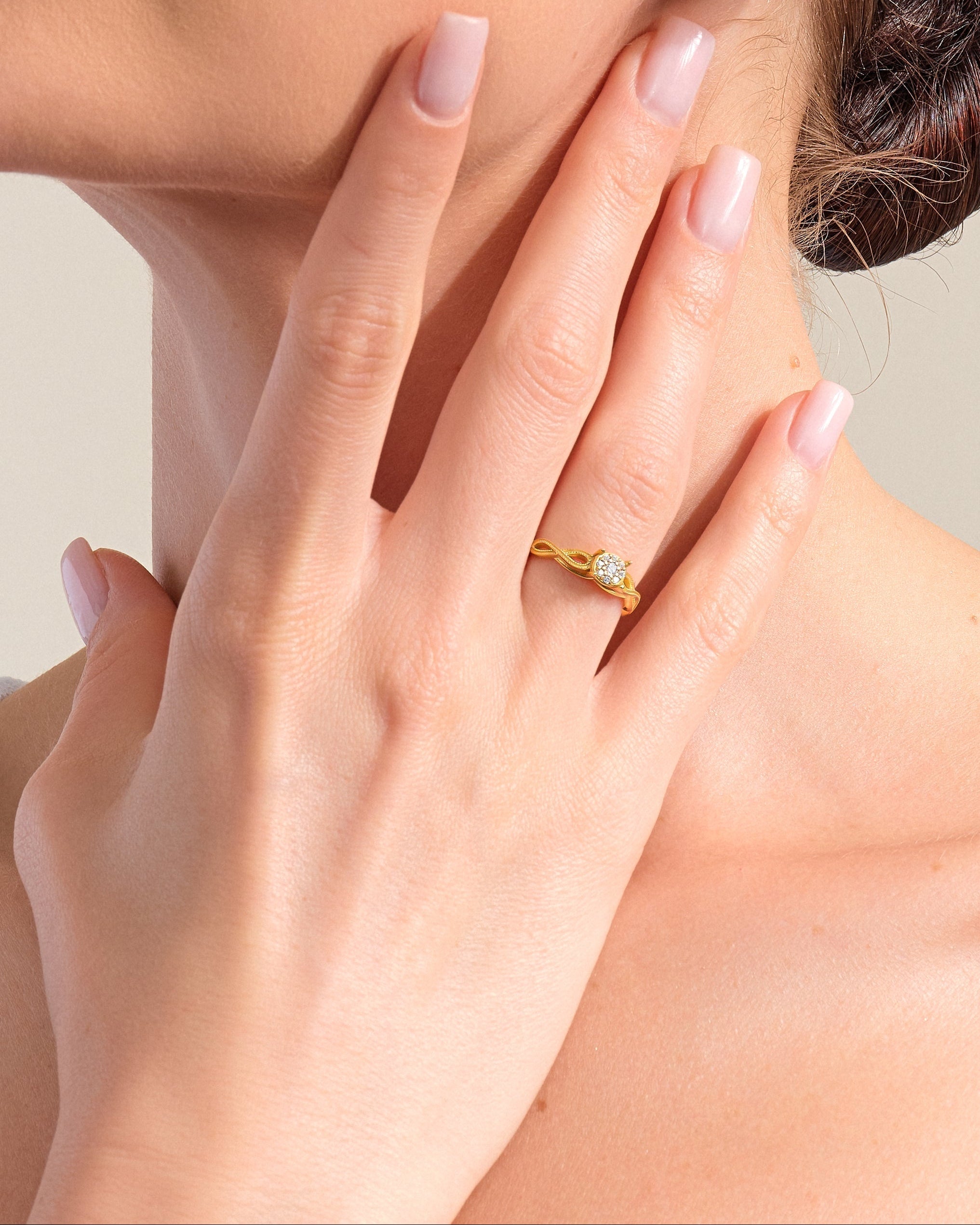 Gold diamond ring and lightning bolt earrings from jewelry brand