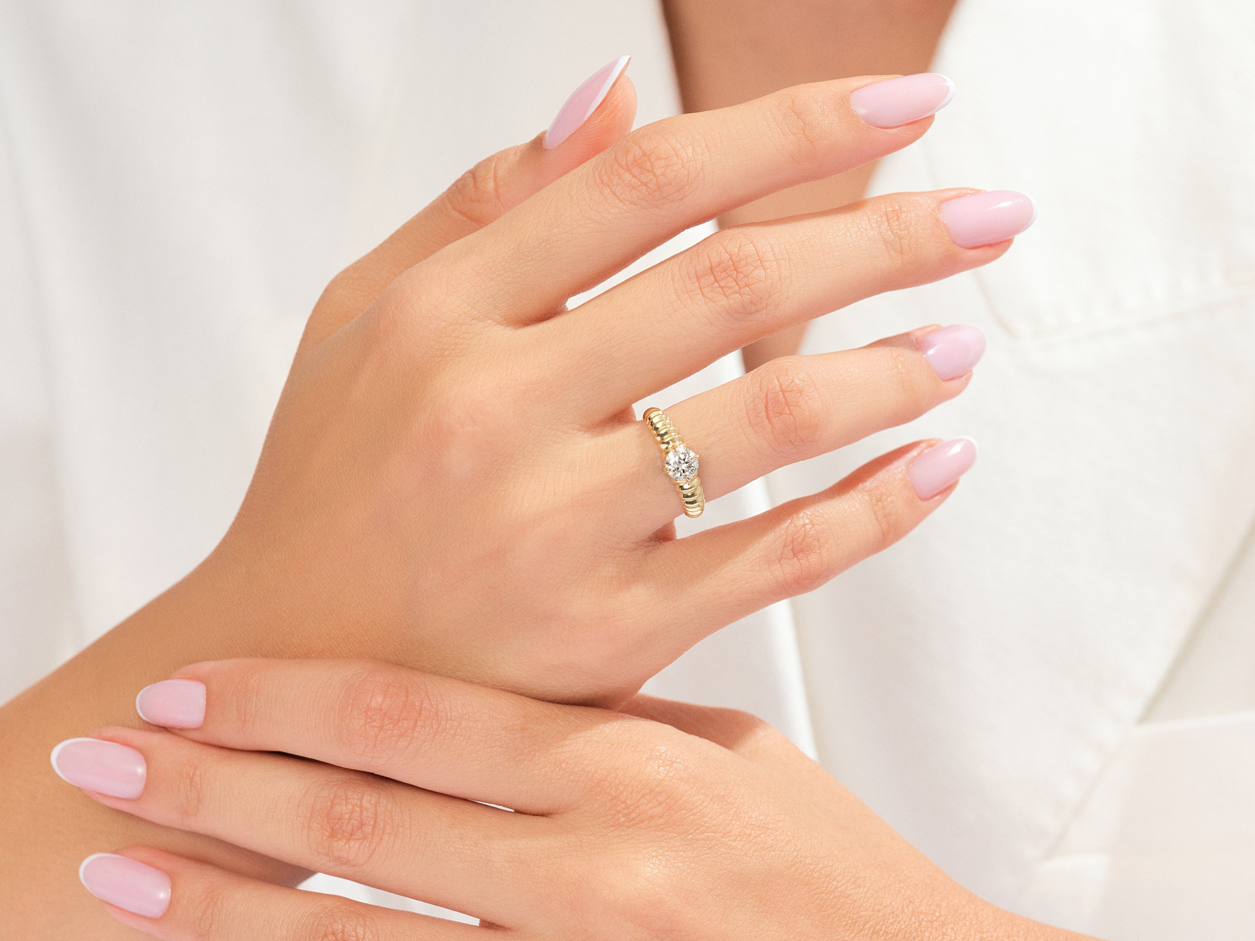 EG238_Model_Wearing_Twisted_Solitaire_Promise_Ring_1.jpg