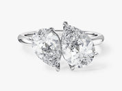Two pear-shaped diamonds on a platinum ring