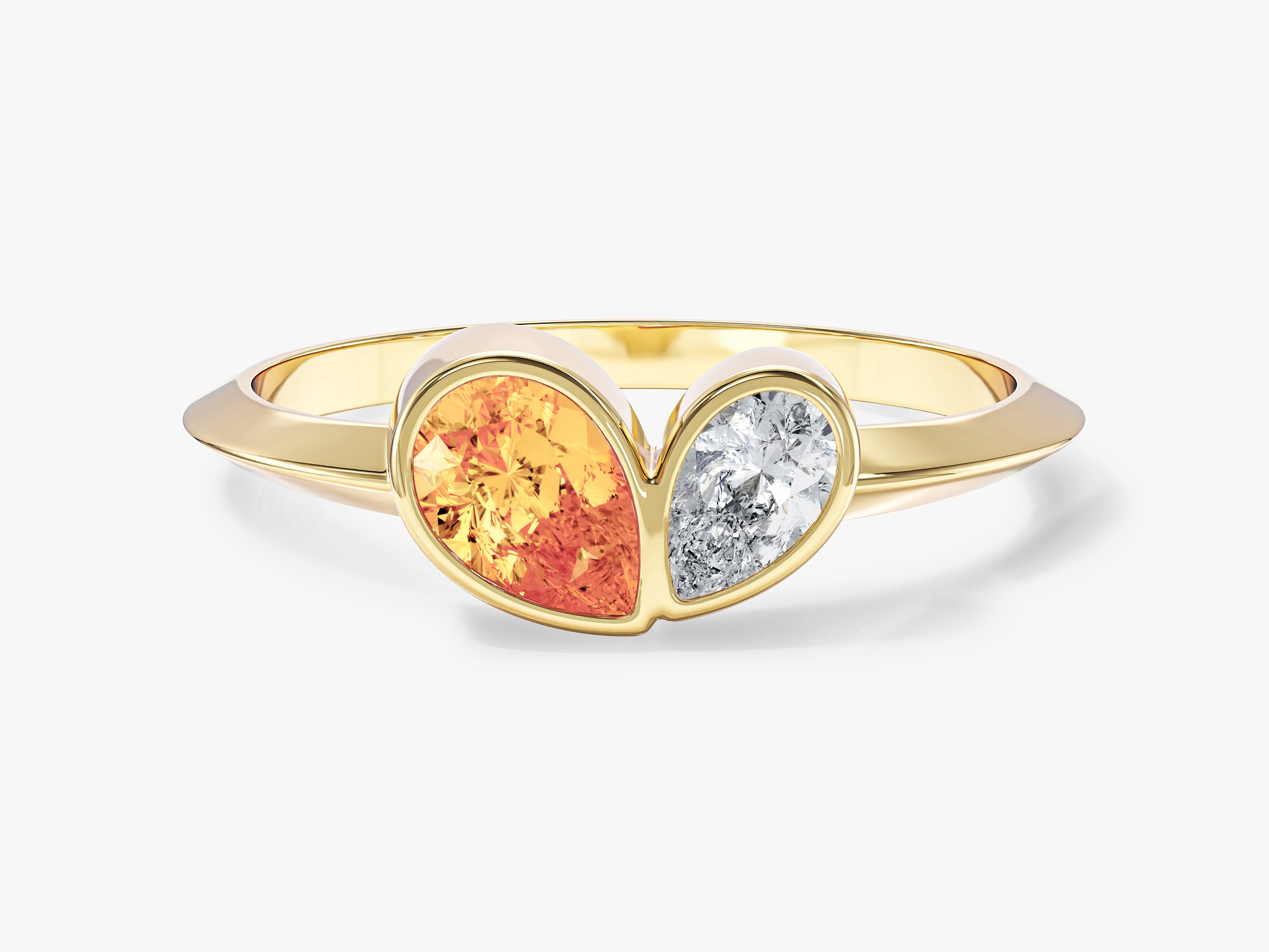 Gold ring with pear-shaped orange sapphire and diamond