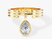 Gold ring with pear-shaped diamond pendant from jewelry collection
