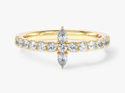 Gold diamond ring with pear and round cut stones