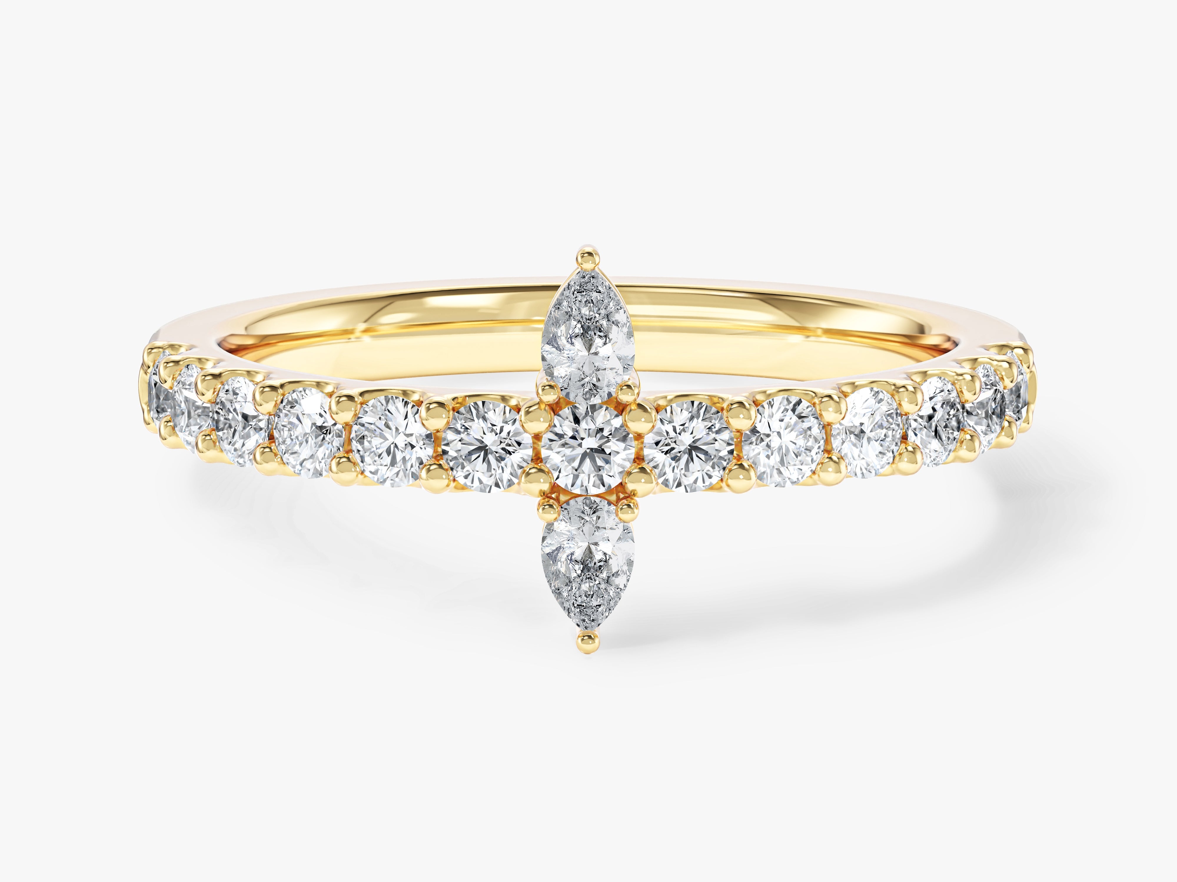 Gold diamond ring with pear and round cut stones