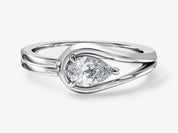 Pear cut diamond engagement ring in white gold