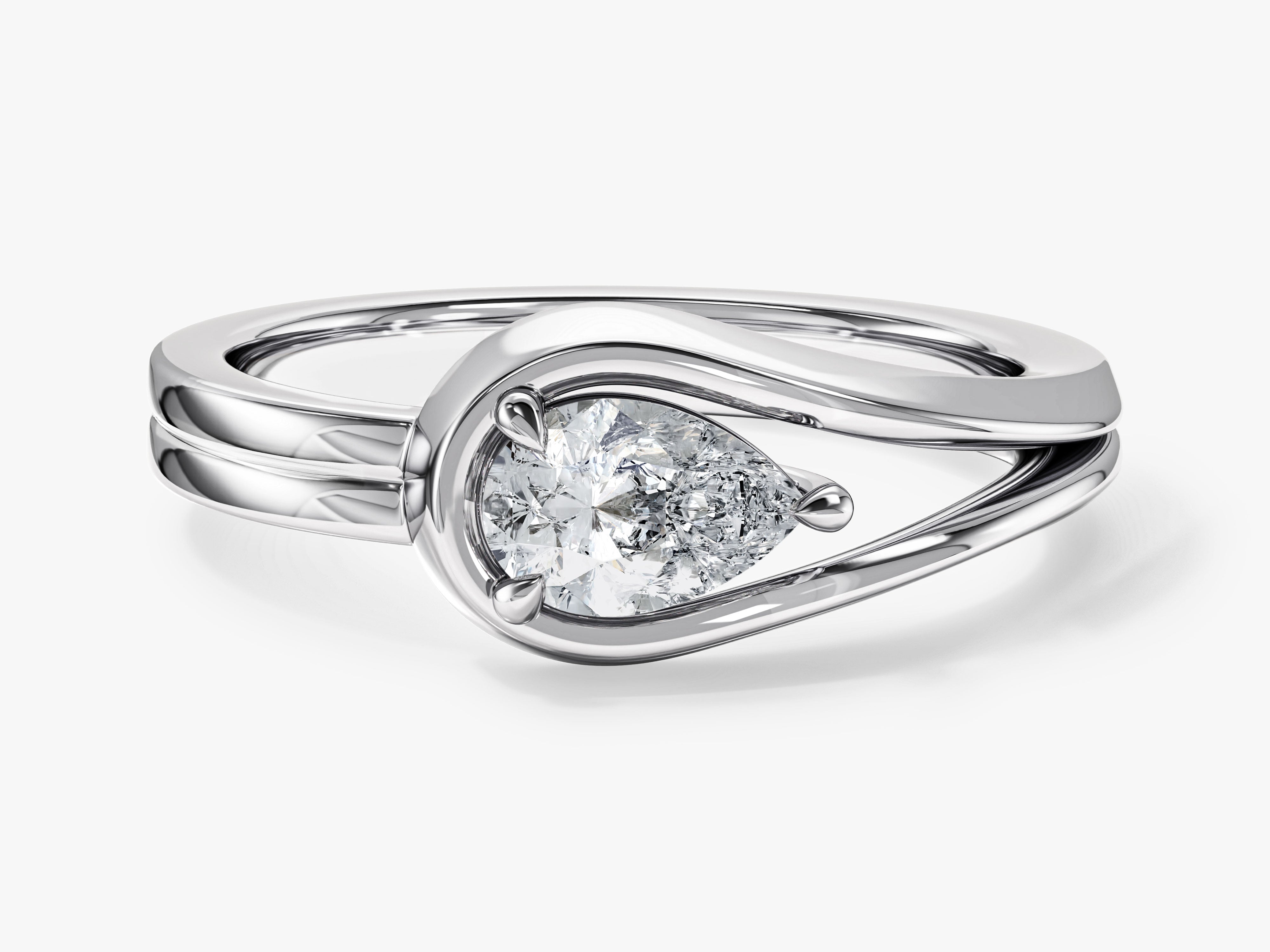 Pear cut diamond engagement ring in white gold