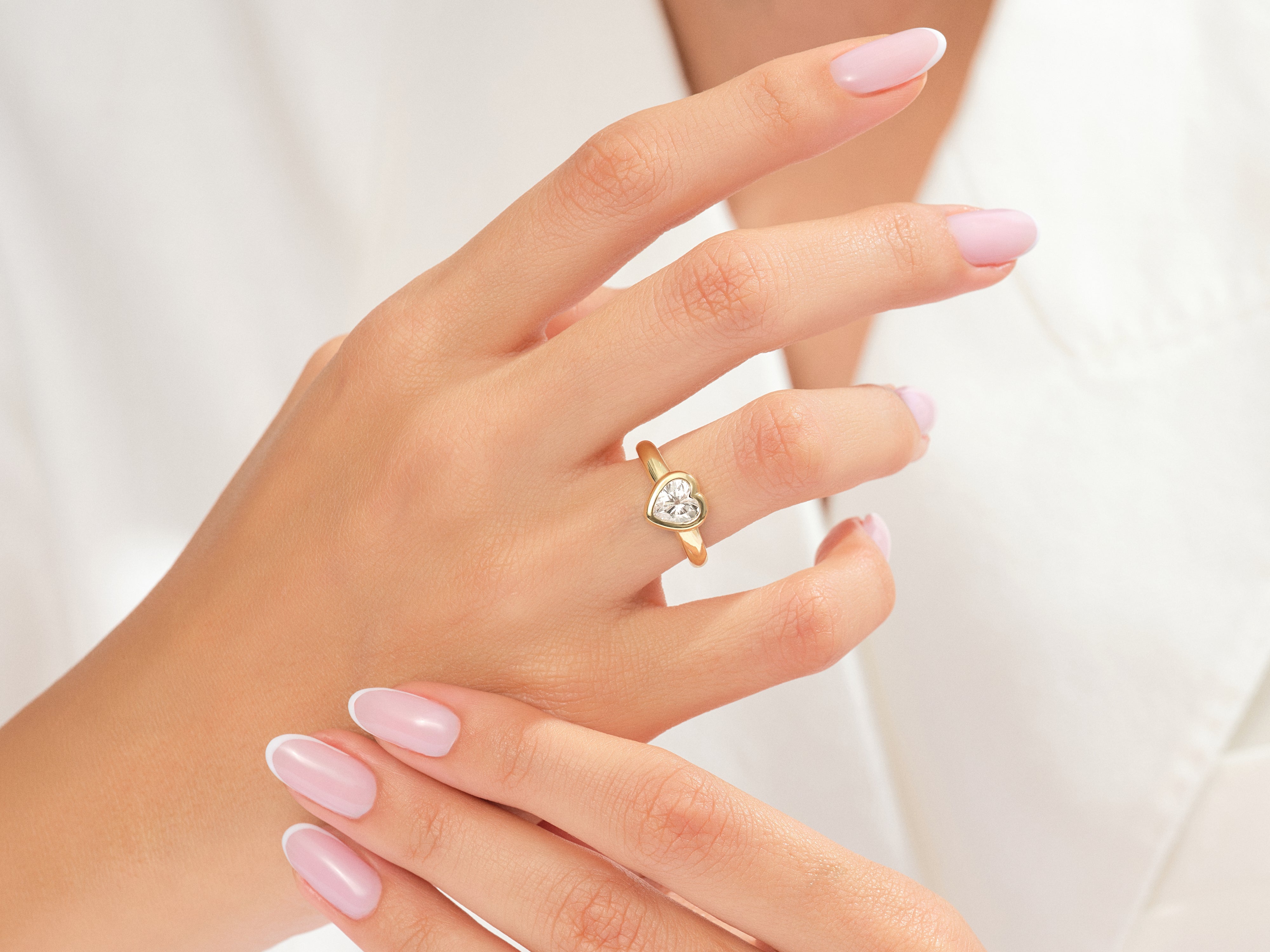 EG247_Model_Wearing_Bezel_Heart_Promise_Ring_2.jpg