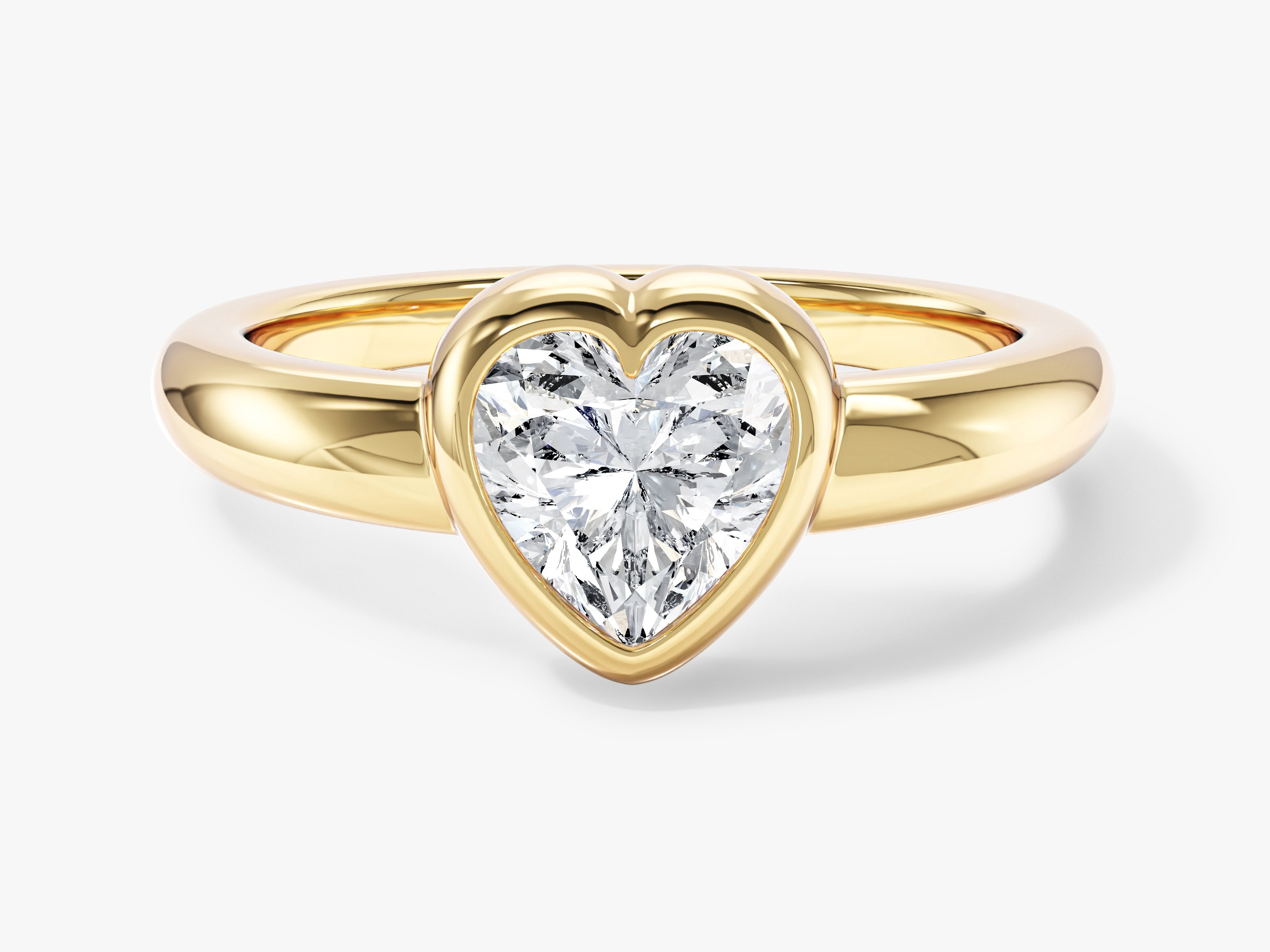 Gold ring with heart-shaped diamond engagement jewelry