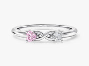 Infinity ring with pink and white heart diamonds, fine jewelry