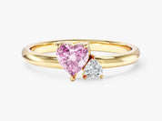 Gold ring with heart-shaped pink and white diamonds
