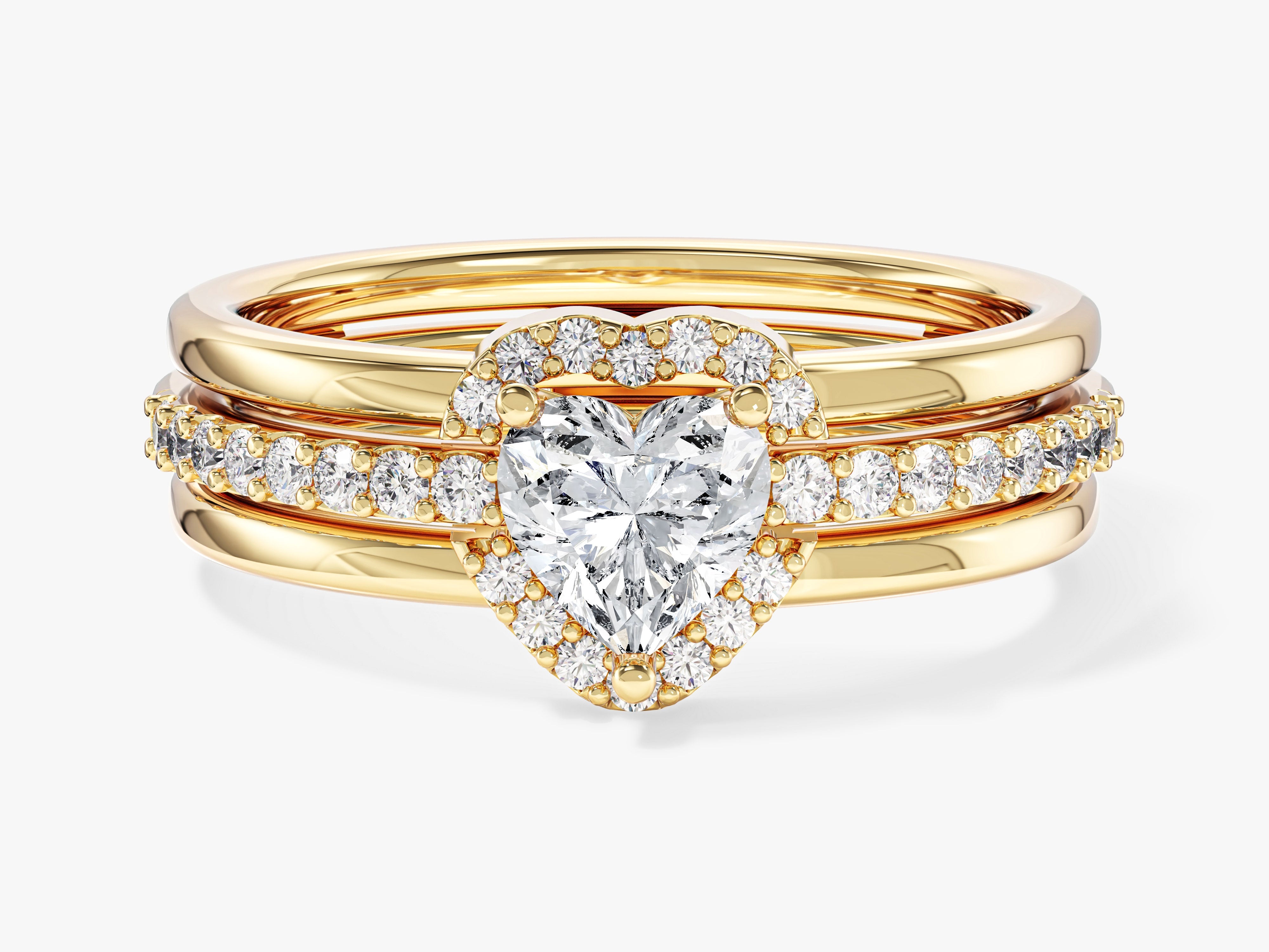Gold diamond engagement ring set with heart-shaped center stone