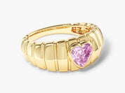 Gold ring with pink heart-shaped gemstone, jewelry design