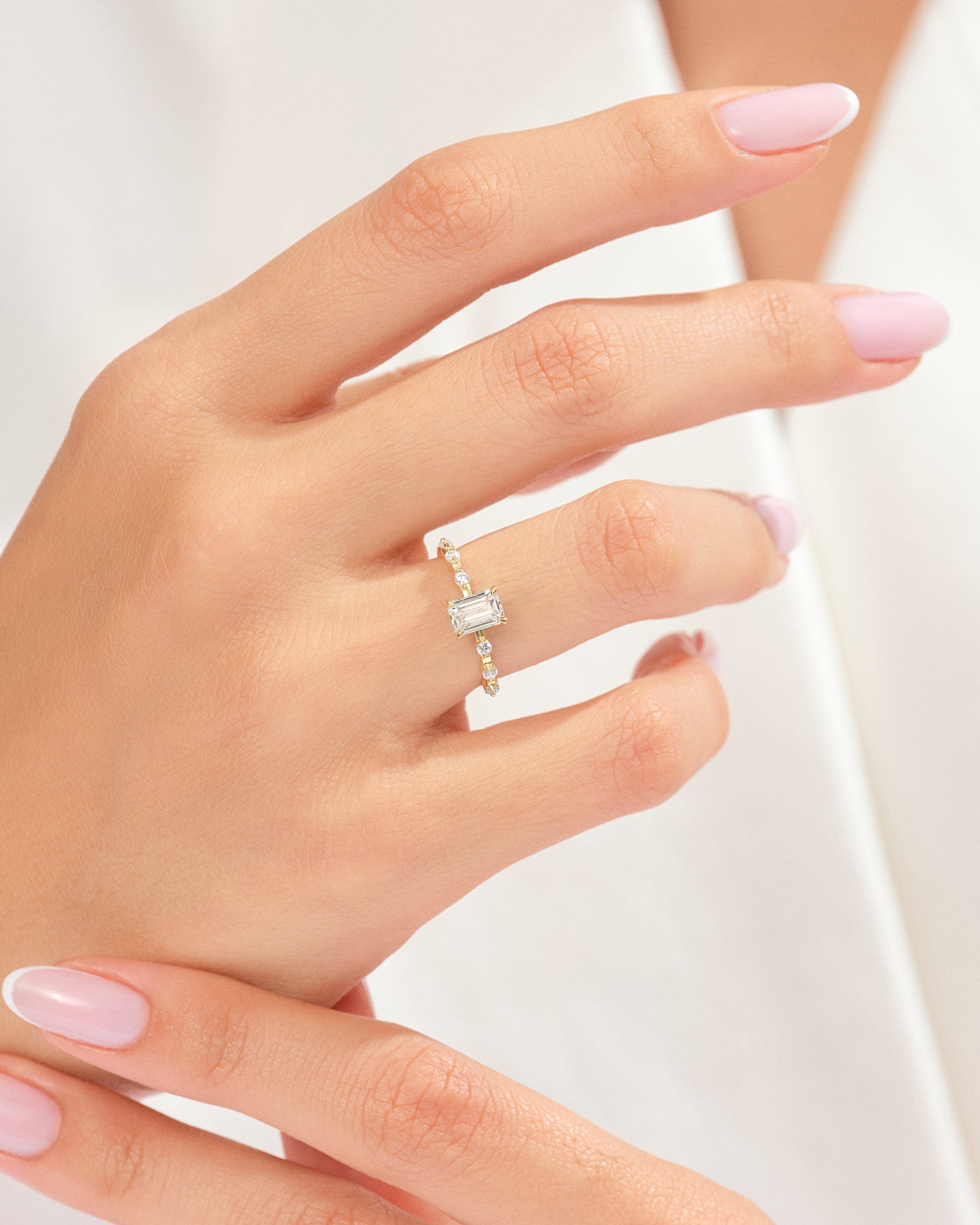 Elegant diamond ring on a woman's hand, fine jewelry for sale