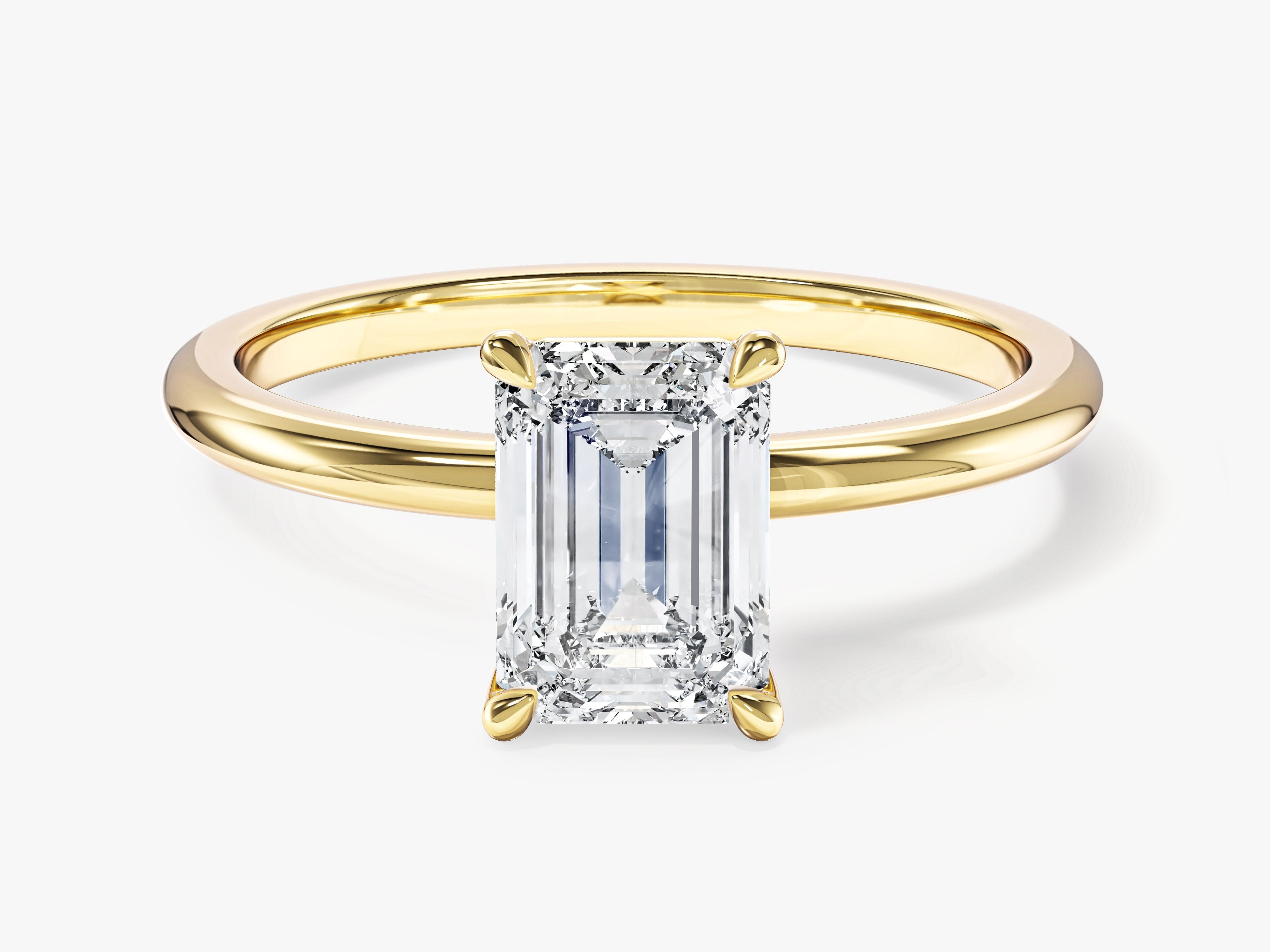 Emerald Solitaire Engagement Ring