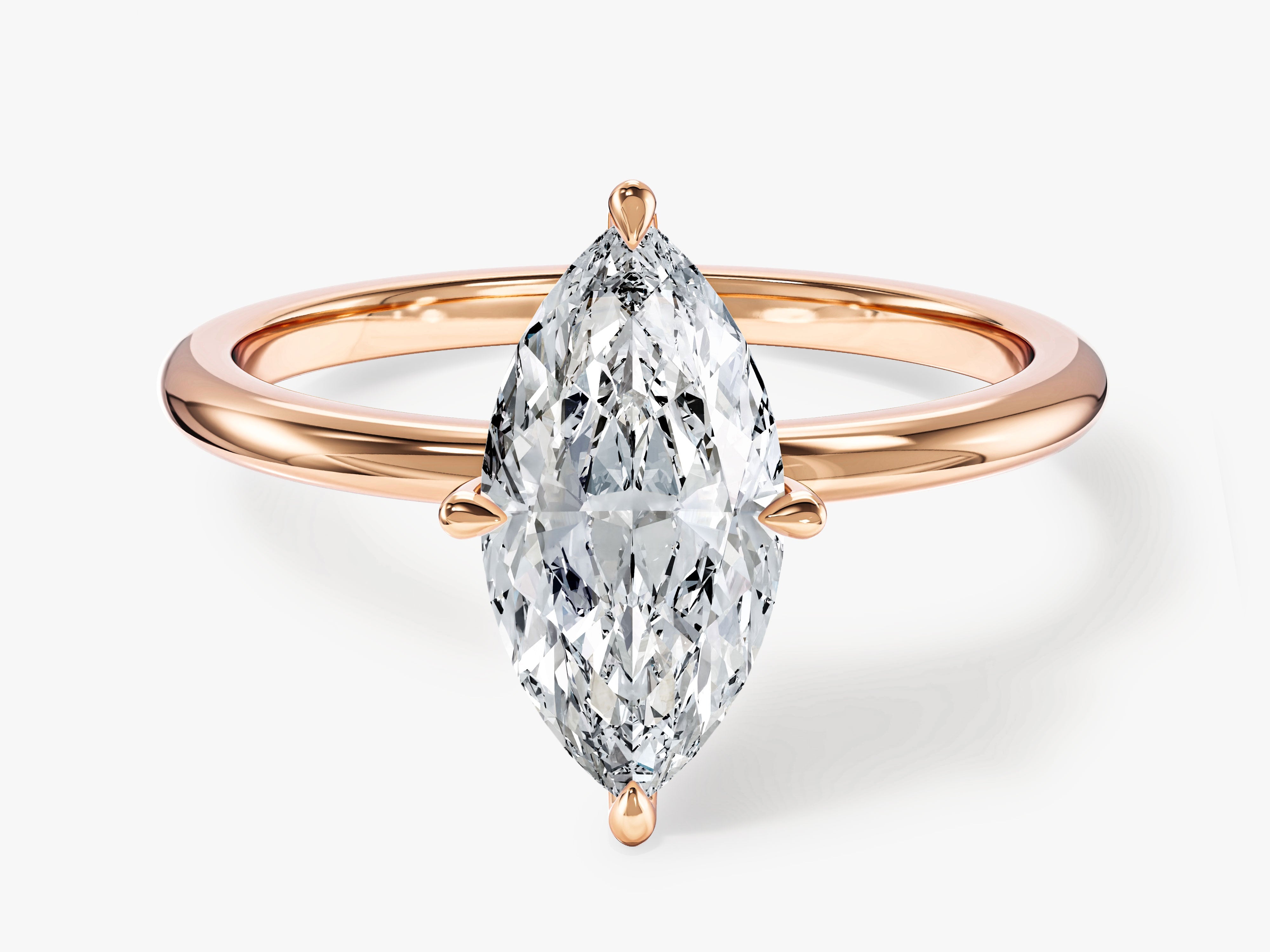 Marquise diamond engagement ring in rose gold setting