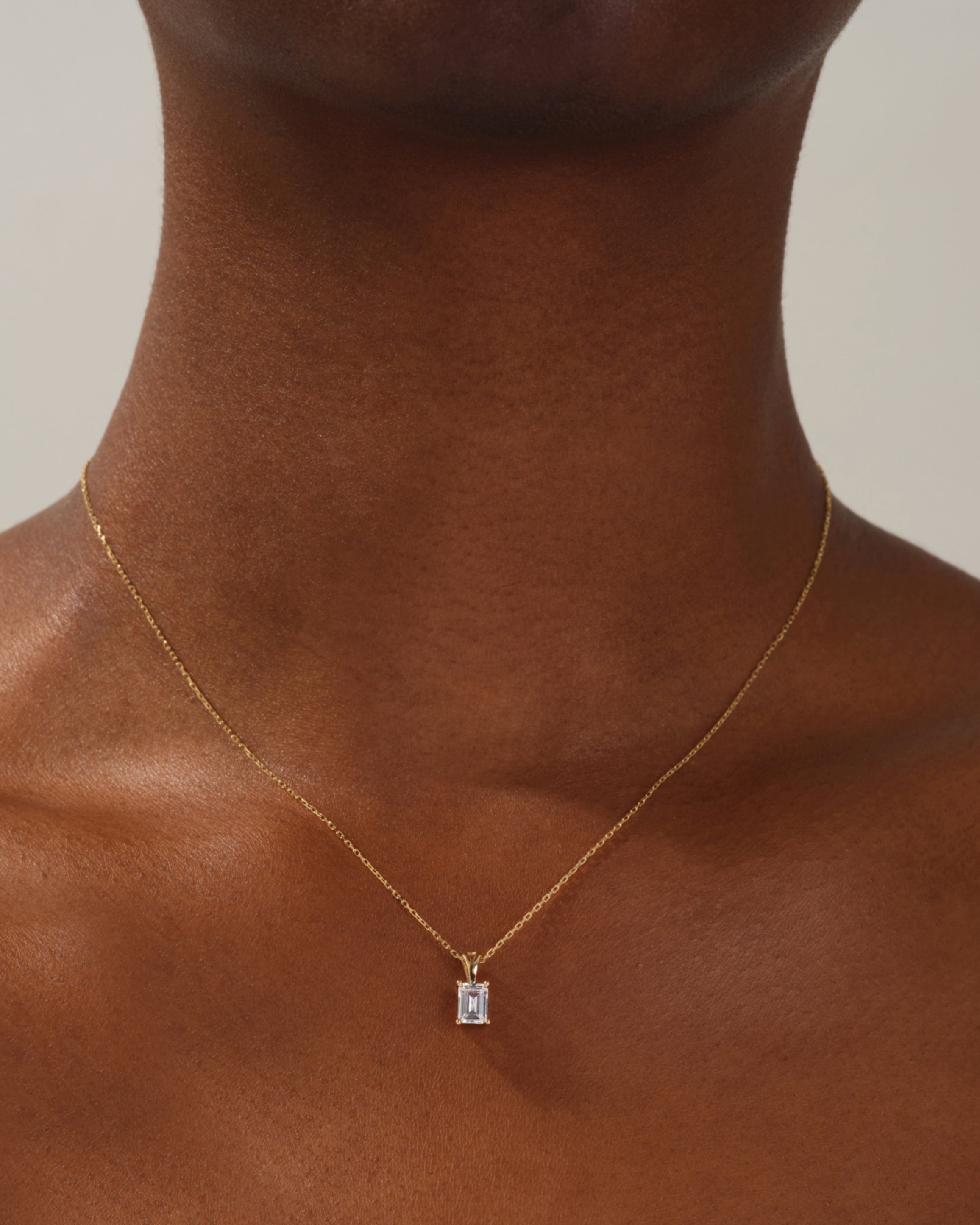 Emerald Cut Solitaire Pendant (0.50 CT)
