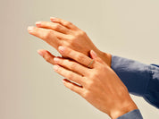 Diamond band ring on a woman's hand, elegant jewelry for her