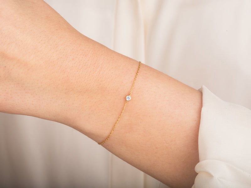 Yellow, White, Rose, 0.02ct, 0.03ct, 0.05ct, 0.10ct, 14k Gold Bezel Set Diamond Bracelet on a Woman's Wrist